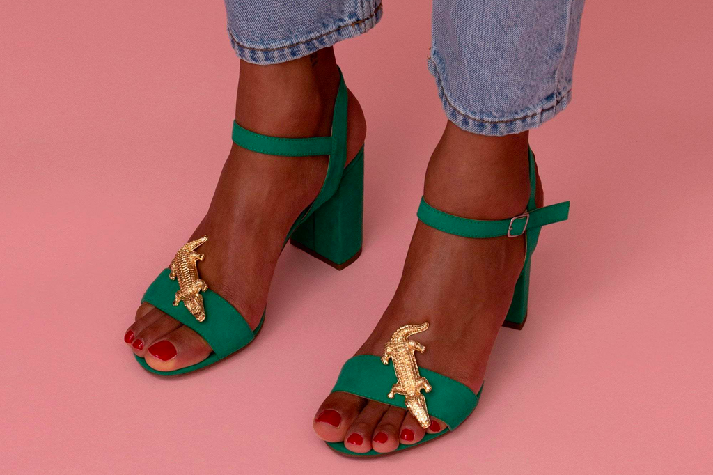 green sandals with gold crocodile clip jewel
