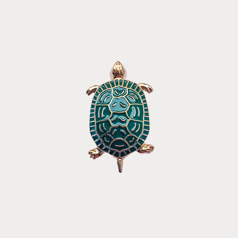 Jewel clip in the shape of a green turtle