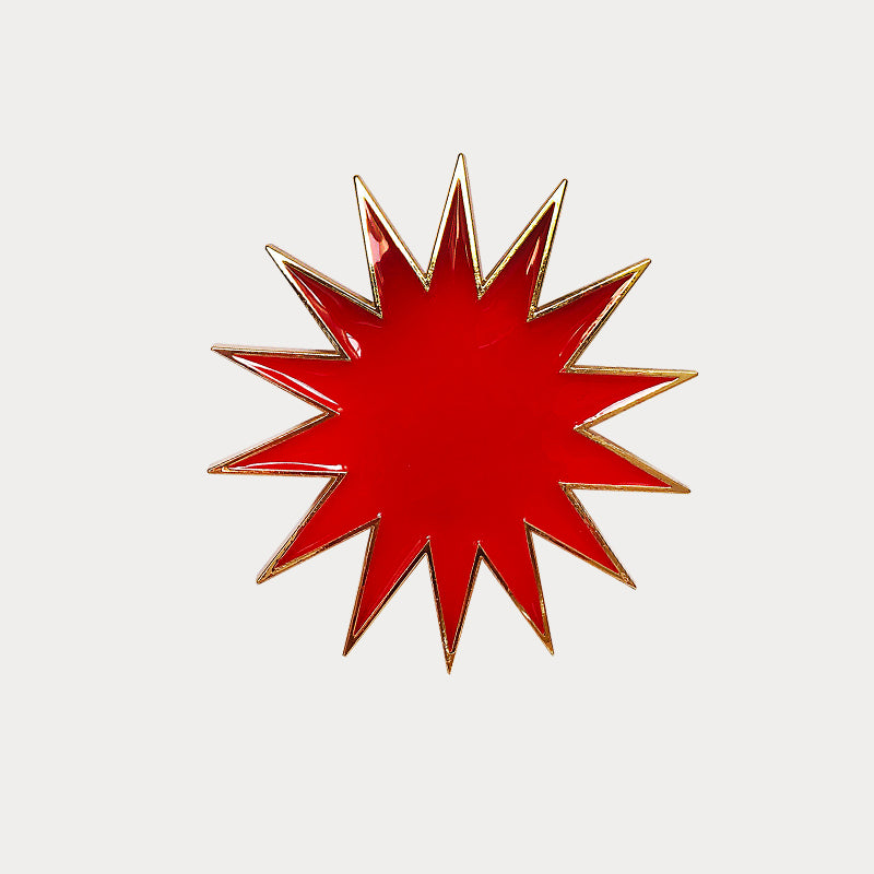 Jewellery clip in the shape of a red star